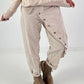 Hose mit elastischem Bund und Knopfleiste quer - beige