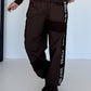 Hose mit City-Statement-Print - mokka