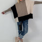Oversized fijngebreide trui met stulpzakken – beige-taupe-zwart