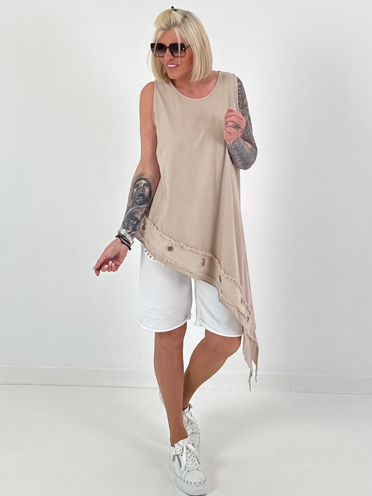 Asymmetric long top with eyelets - beige