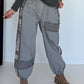 Hose mit City-Statement-Print - grau