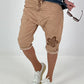 Short baggy shorts with crocheted flowers and sequins - camel