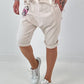Kurze Baggy mit breiten Nähten - beige
