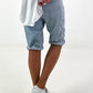 Short baggy jeans with eyelet details - light blue (available from 05/15/26)
