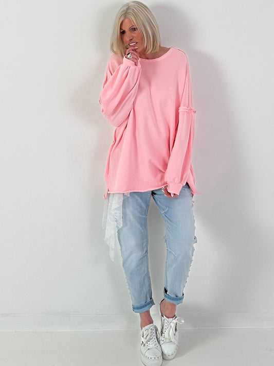 Oversized sweater with trendy left seams - pink