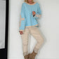 Oversized Sweater mit Strasskreuz - hellblau-beige