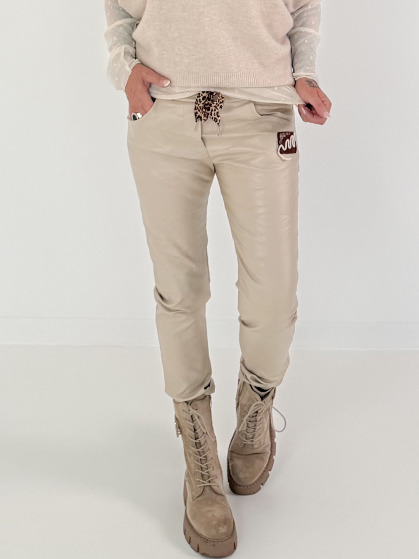 Vegan leather trousers with patch - beige
