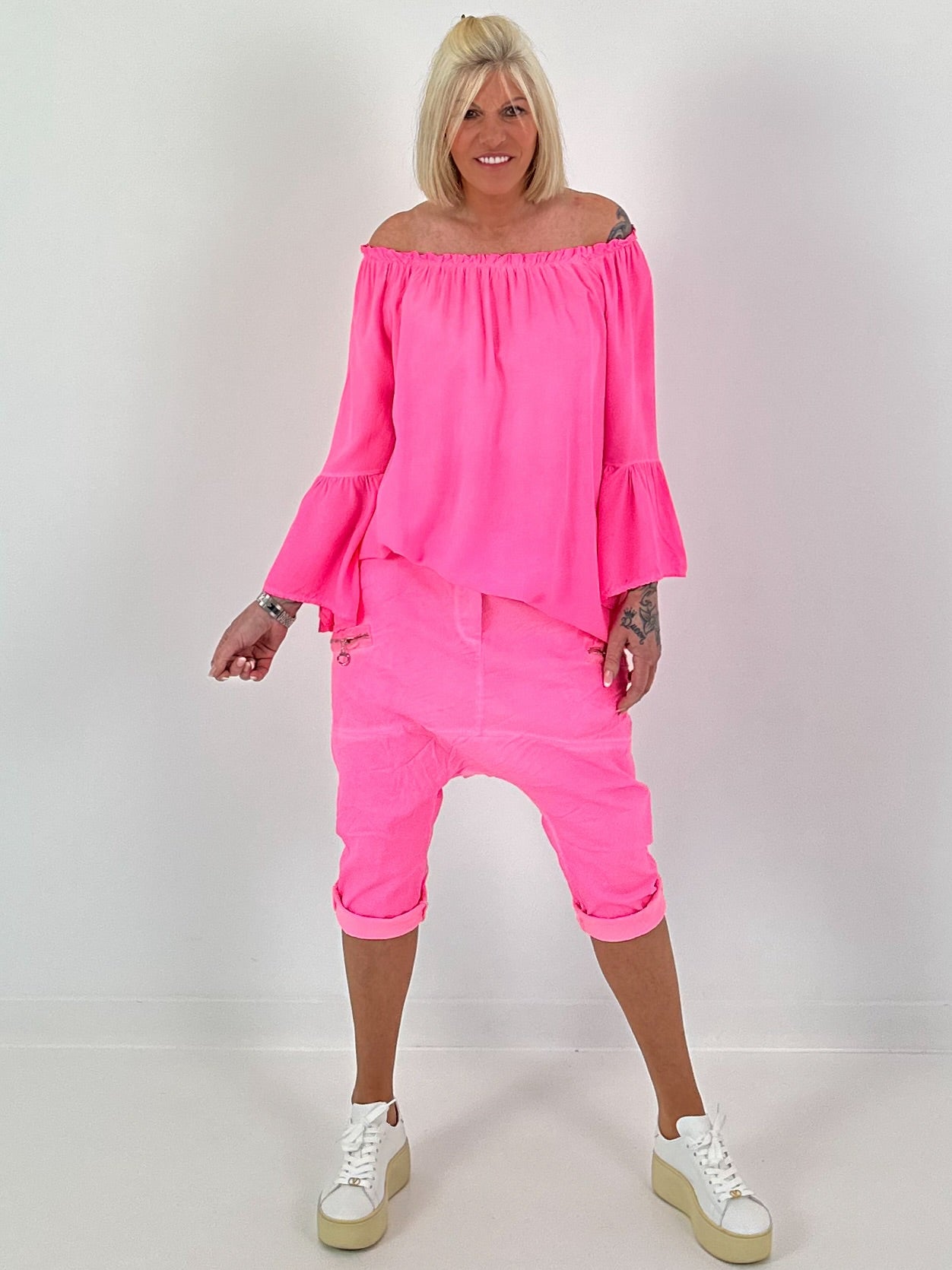 Tunic with gathered round neck and flounce sleeves - neon pink