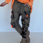 Baggy-Jeans in Used-Optik mit Camouflage-Applikationen - used-denim