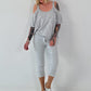 Shirt mit Cold Shoulder und Leo Strass - hellgrau