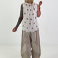 Polka dot top with ruffled collar - beige-taupe