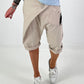 Kurze Baggy mit kleinen Ösen-Details - beige