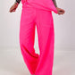Sweatpants with large side pockets - neon pink