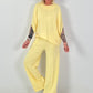 Two-piece set with asymmetrical shirt - yellow