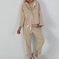 Jacke mit goldenen Nieten-Details - beige