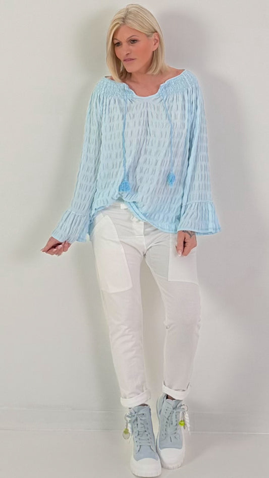 Structured tunic with tie belt and flounced sleeves - light blue