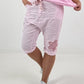 Short baggy shorts with crocheted flowers and sequins - pink