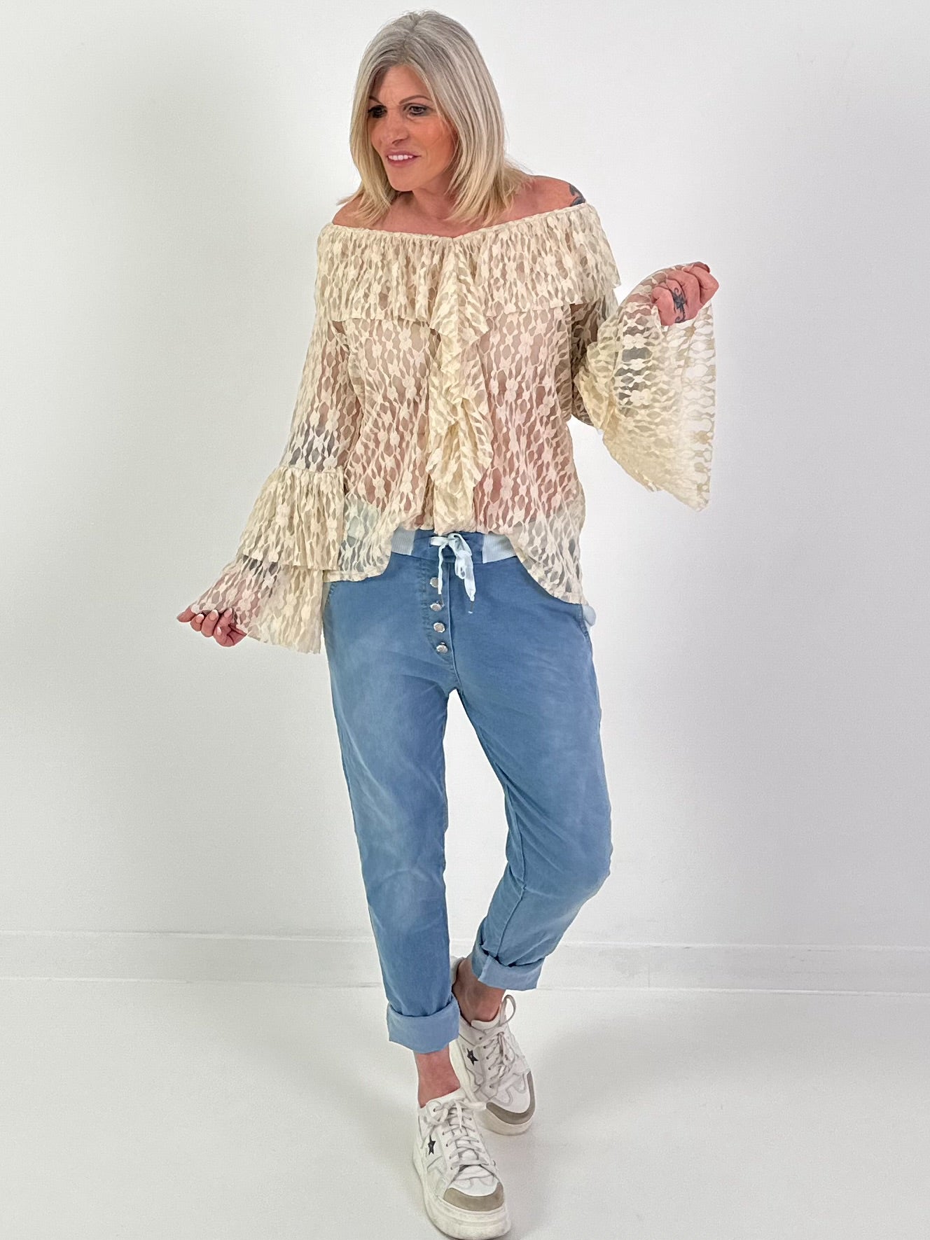 Lace tunic with ruffles - beige