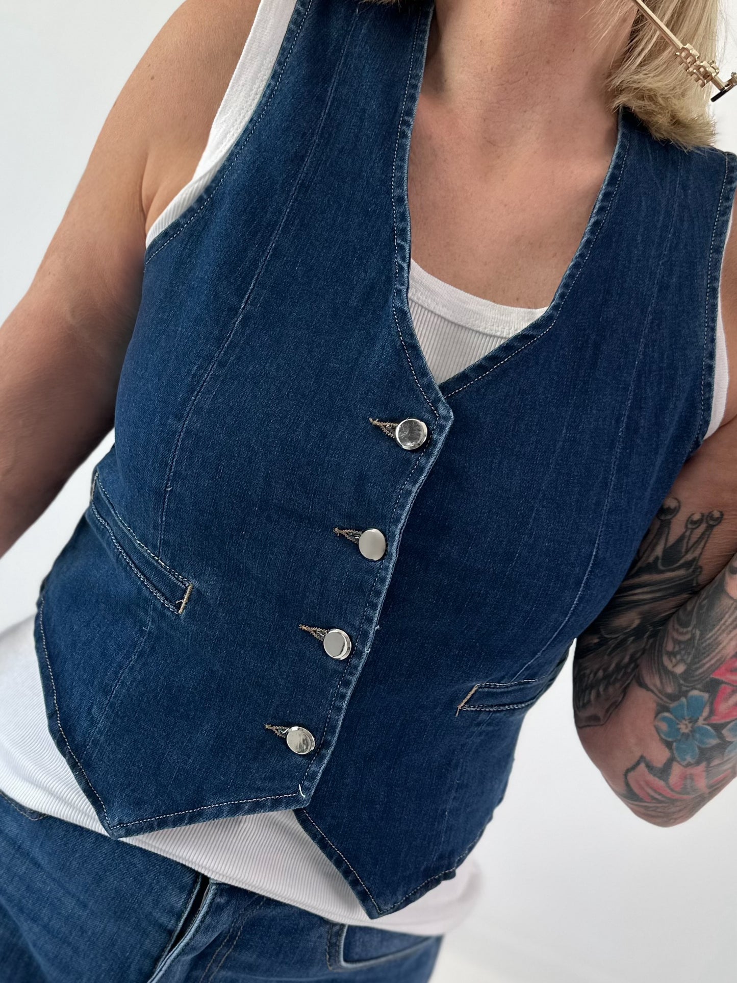 Denim vest with silver buttons
