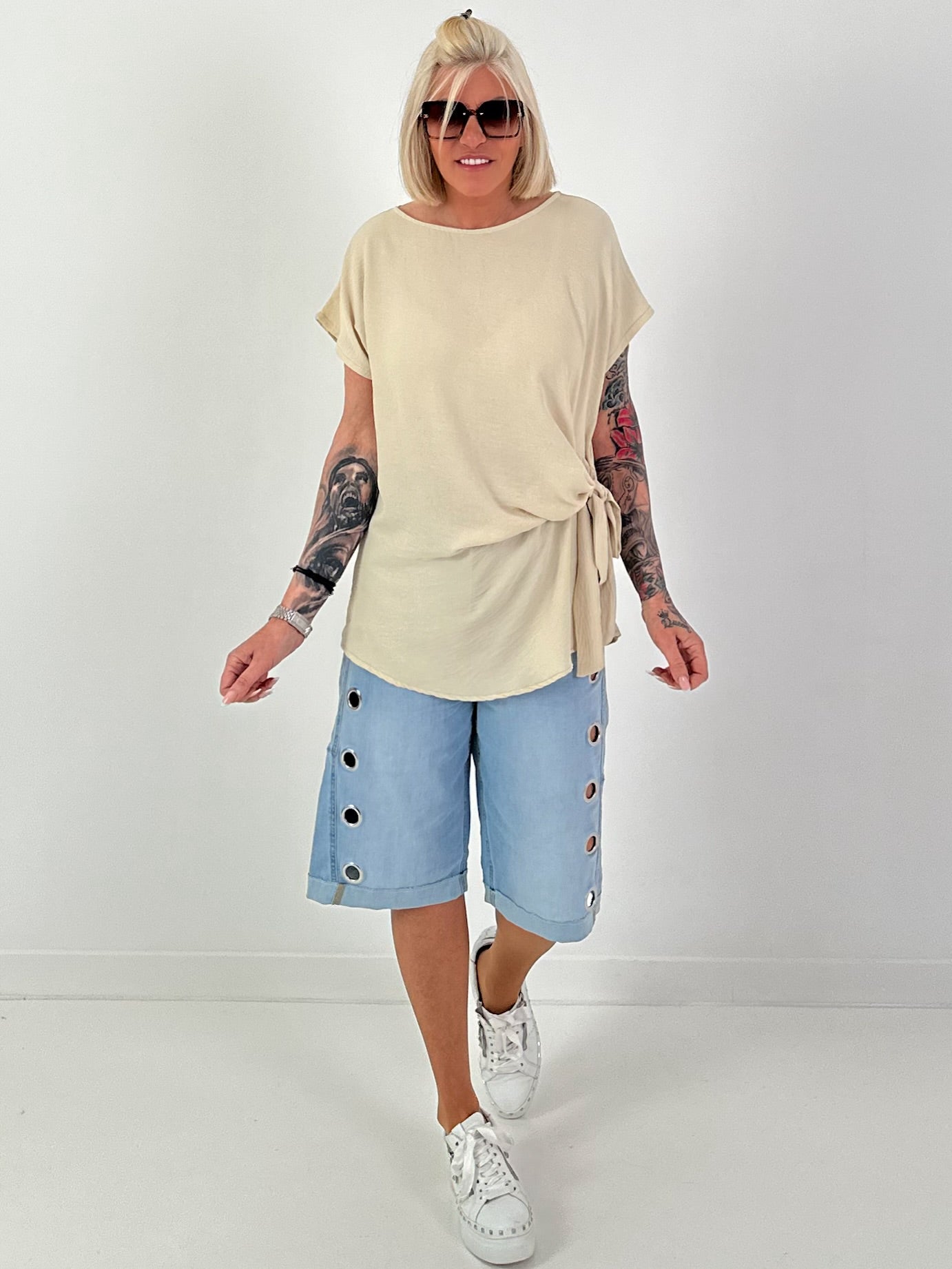 Blouse met strikknoop aan de zijkant - beige