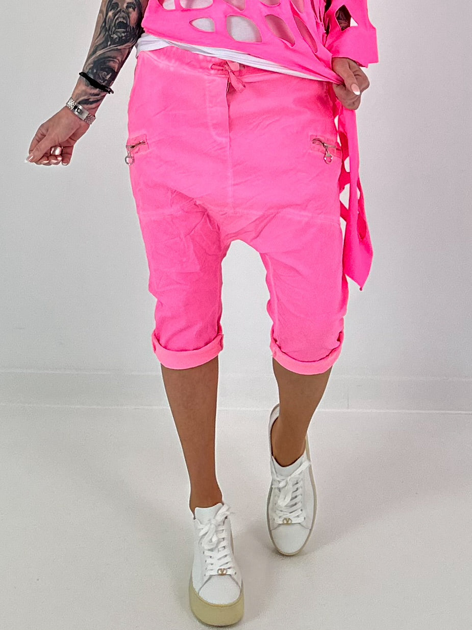 Kurze Baggy mit Zipper Details - neonpink