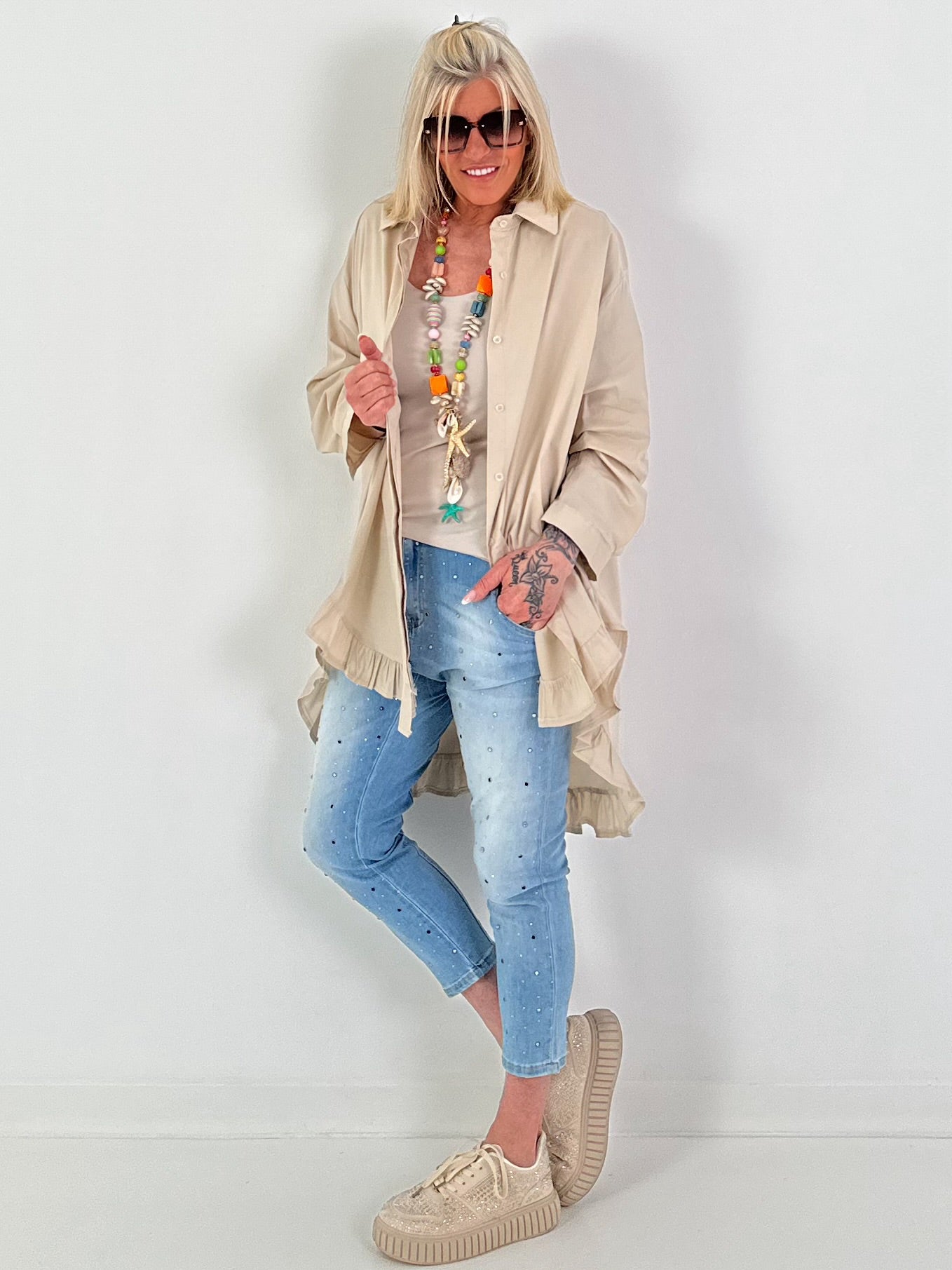 Oversized blouse met ruches – beige