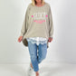 Oversized stonewashed Sweatshirt Modell "Glück..." - beige