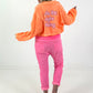 Short jacket with back print - neon orange