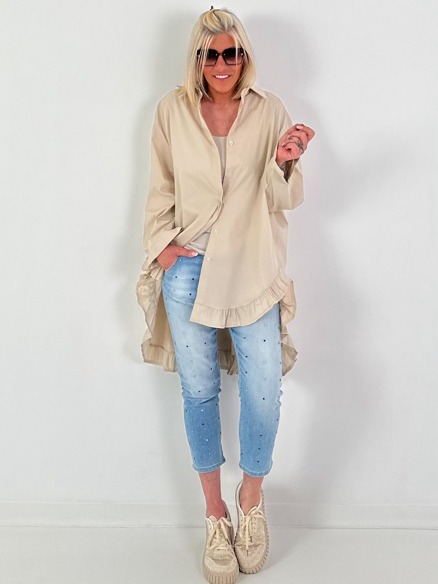 Oversized blouse met ruches – beige