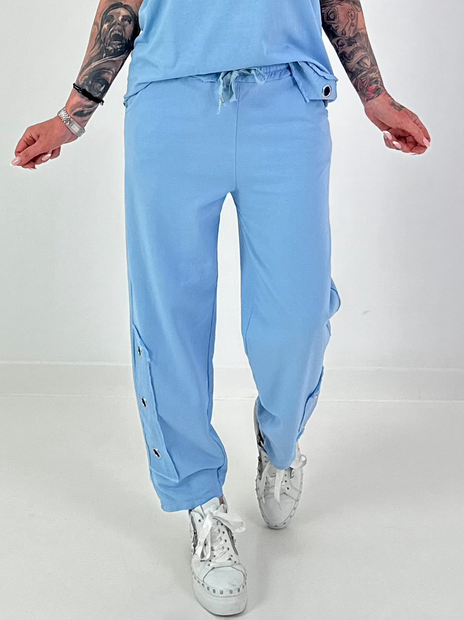 Sweatpants with eyelets - light blue