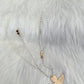 Necklace with angel pendant - white gold