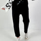 Trousers with wide pleats - black