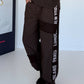 Hose mit City-Statement-Print - mokka