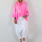 Bluse mit Cold Shoulder und fransigen Abschlüssen - neonpink