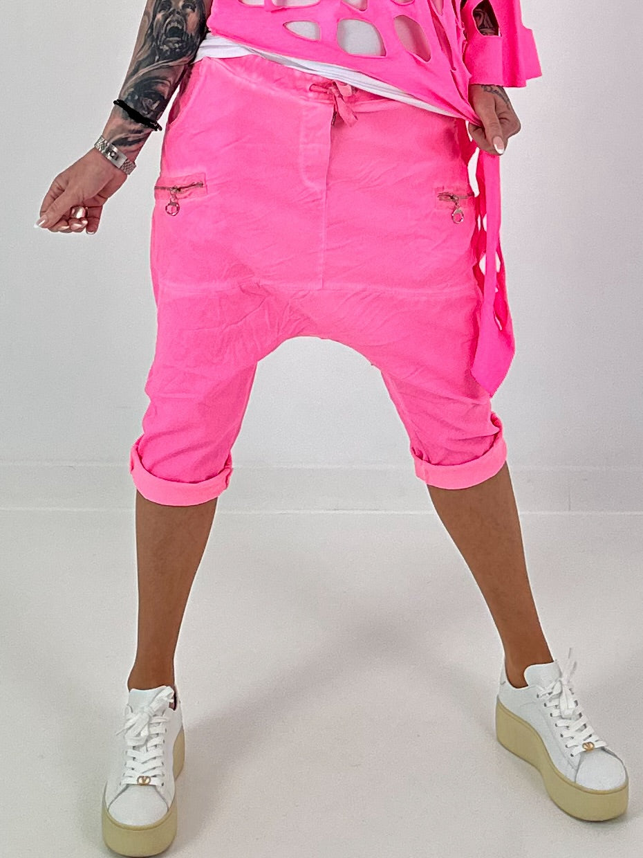 Kurze Baggy mit Zipper Details - neonpink