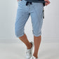 Kurze Baggy Jeans mit Ösen-Details - hellblau