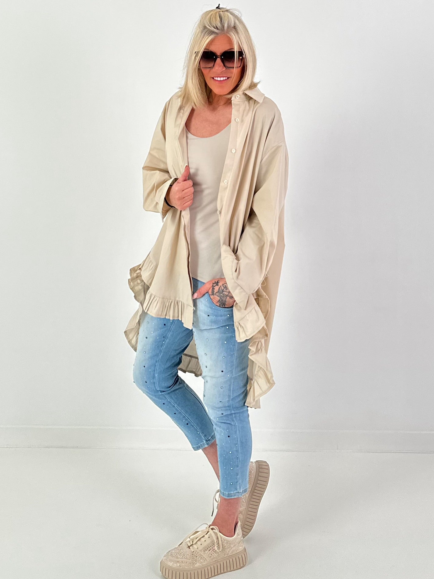 Oversized blouse met ruches – beige