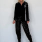 Hemdbluse mit Lederoptik-Elementen und Statement-Patch - schwarz