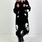 Oversized Strickmantel mit Kapuze Modell "Skull" - schwarz-weiss ( lieferbar ab ca. 13.12.25)