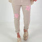Trousers with stars - beige