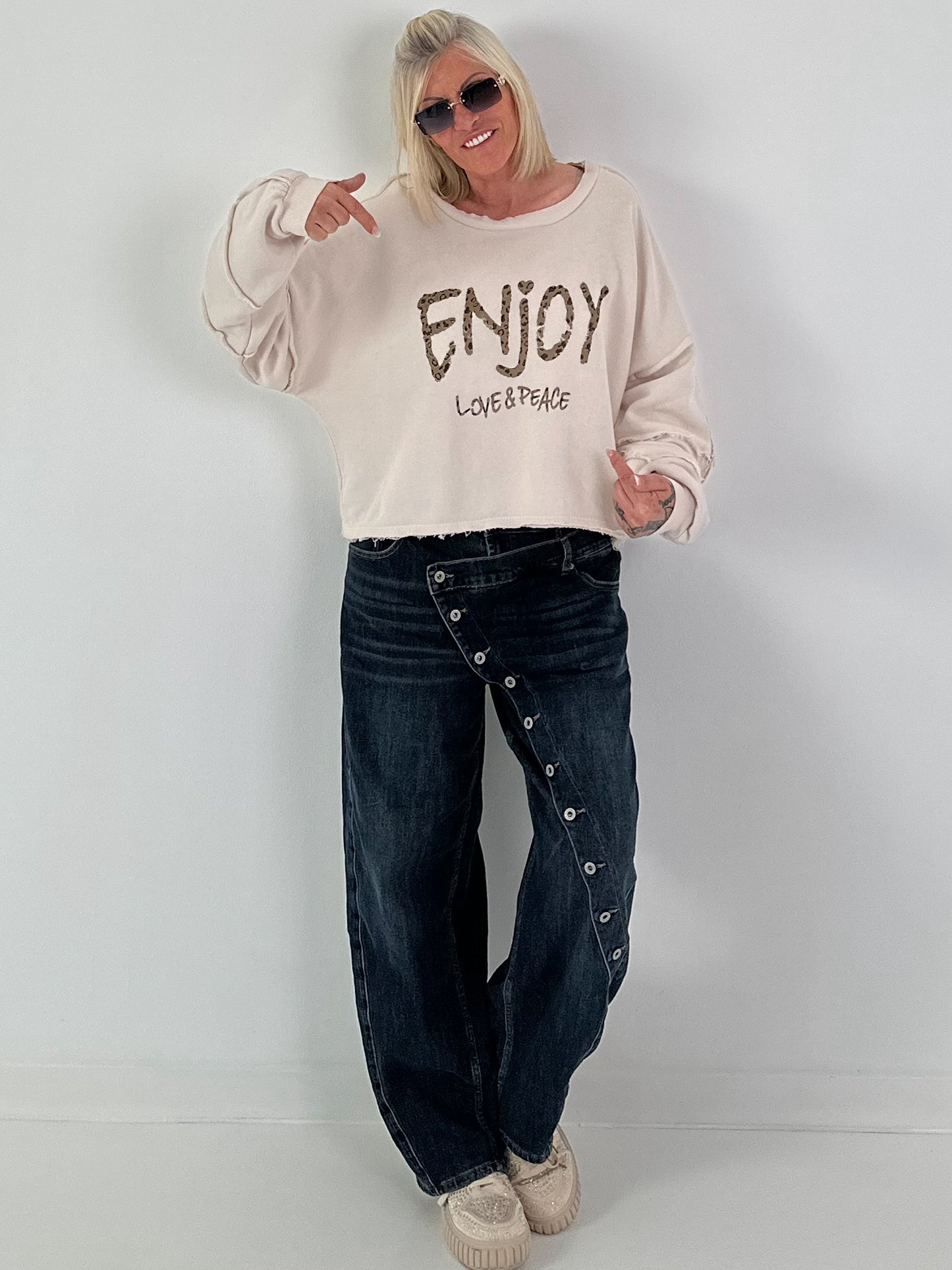 Sweater mit Linksnähten und Print - beige