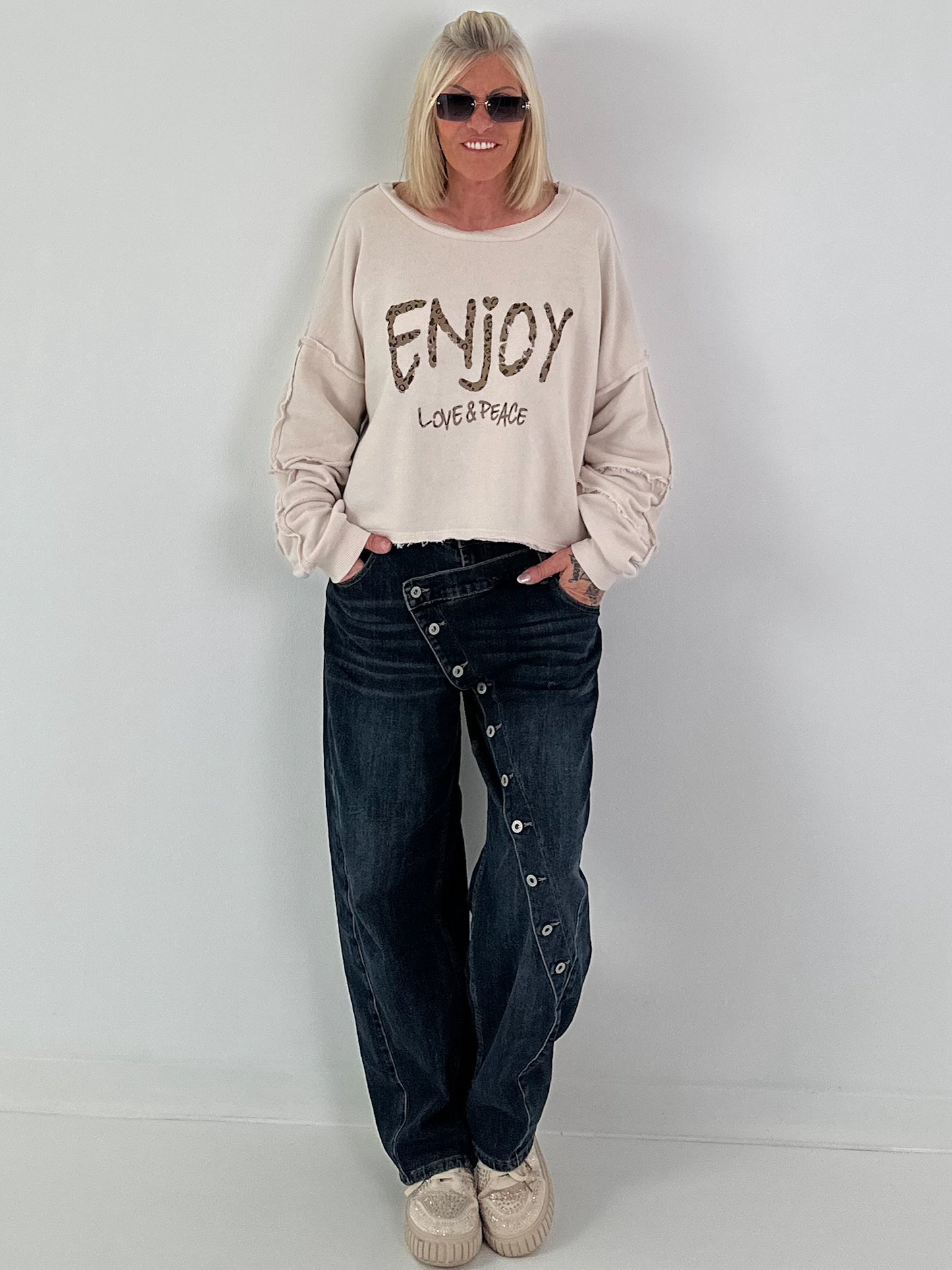 Sweater mit Linksnähten und Print - beige