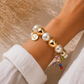Giuno Armband mit Kreuzanhänger - weiss-gold
