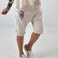 Kurze Baggy mit breiten Nähten - beige