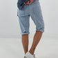 Kurze Baggy Jeans mit Ösen-Details - hellblau