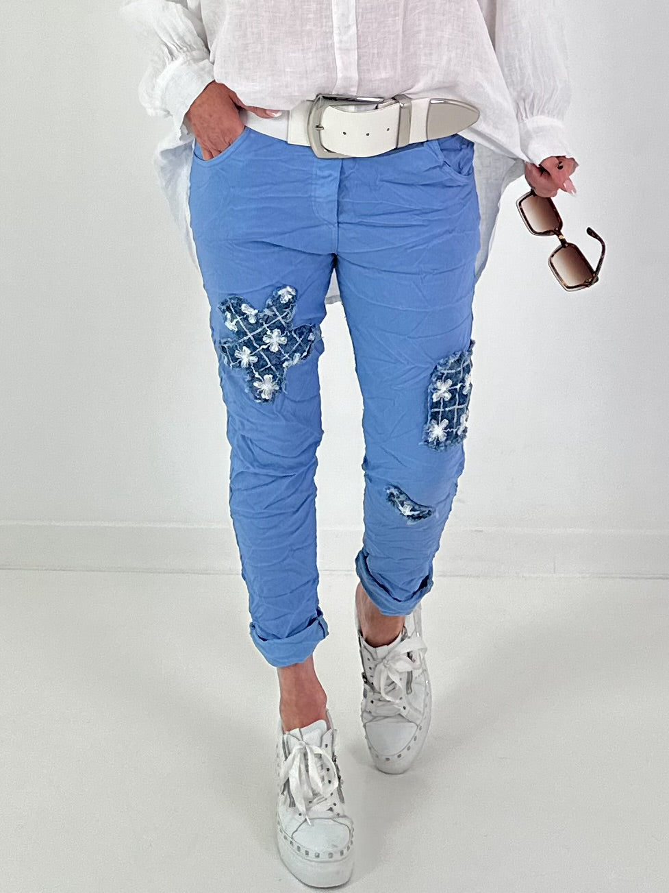 Light blue jeans with denim and sequin details