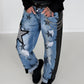 Boyfriend Jeans mit allover Sternen-Print und Ledereinsätzen - schwarz-denim