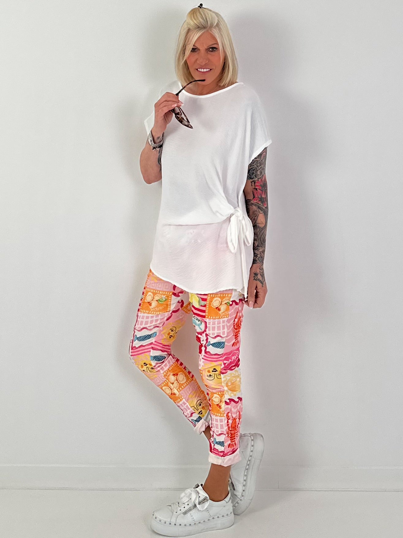 Blouse-style top with side tie knot - white
