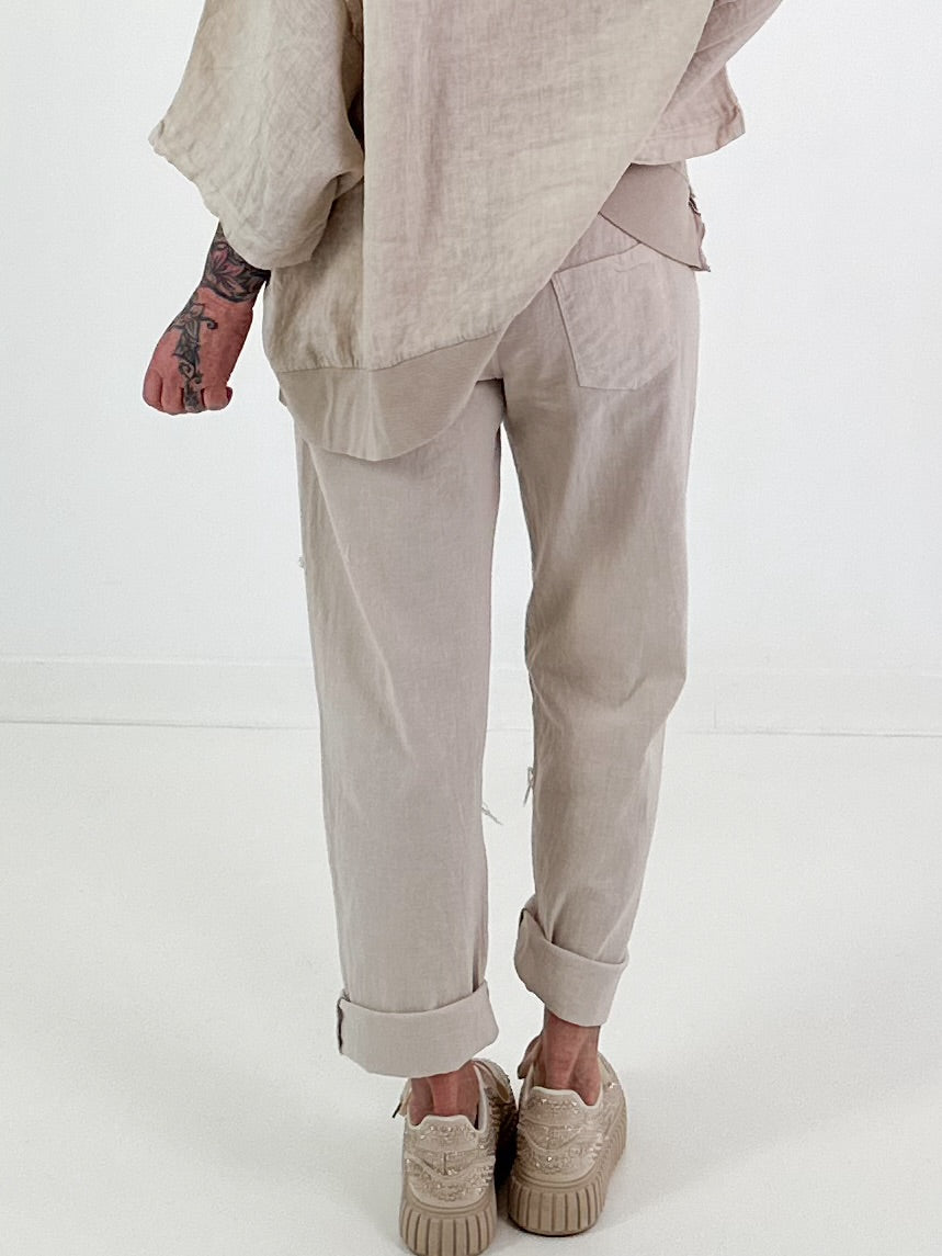 Linnen broek met opgestikte zakken en franjes - beige