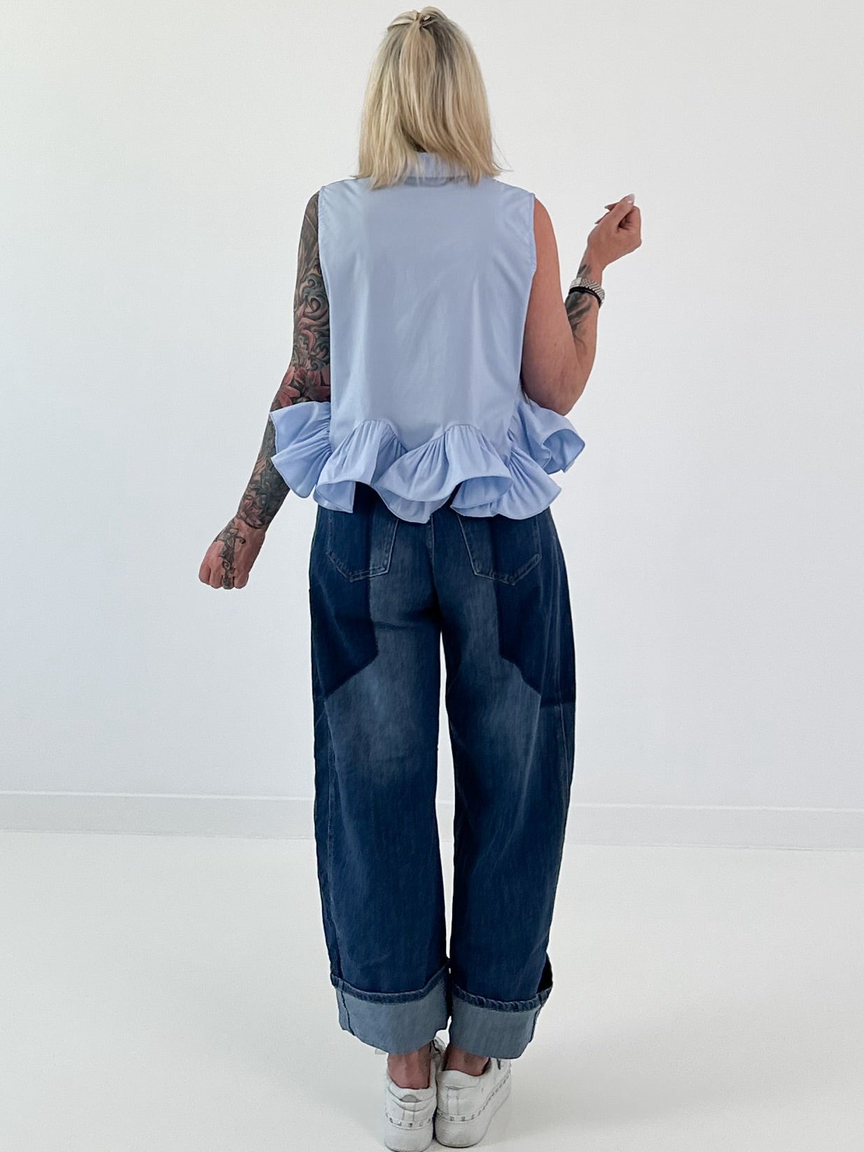 Sleeveless blouse with ruffles - light blue